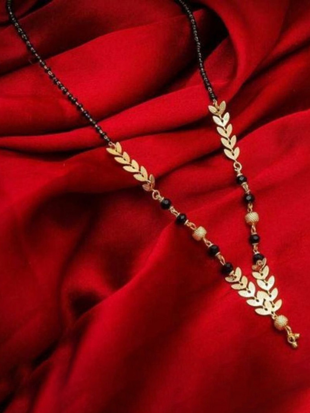 

Wynona Tanmaniya Set Of 2 Gold-Plated American Diamond Studded & Beaded Mangalsutra