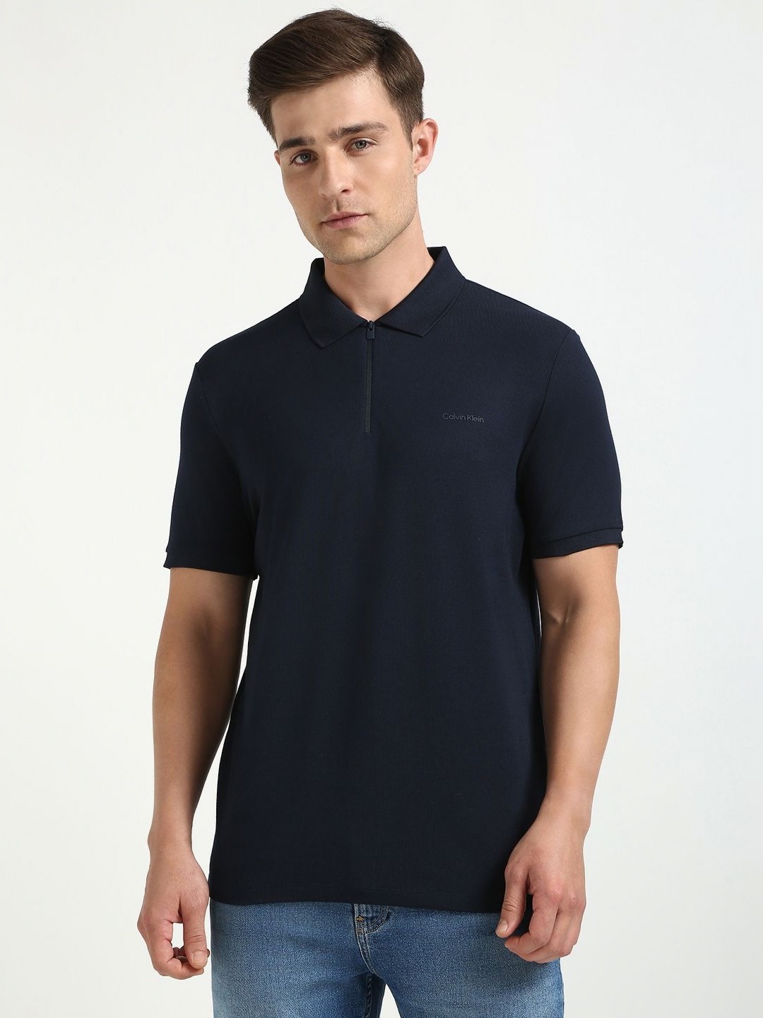 

Calvin Klein Jeans Men Solid Polo Collar Cotton T-shirt, Navy blue