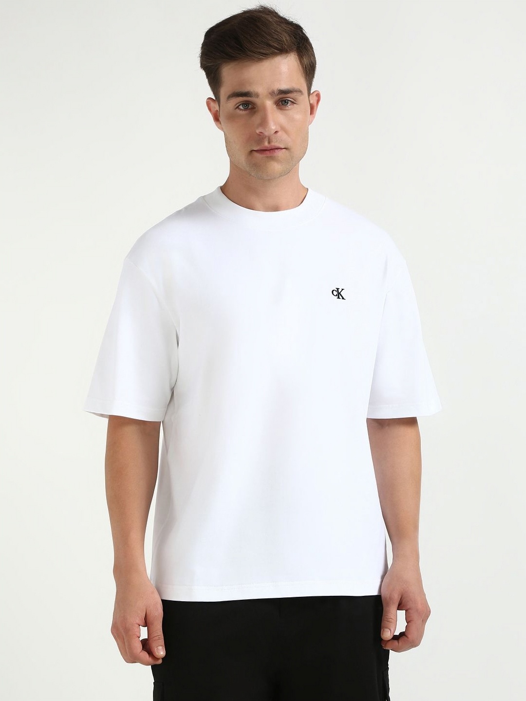 

Calvin Klein Jeans Men Solid Round Neck Cotton Relaxed Fit T-shirt, White