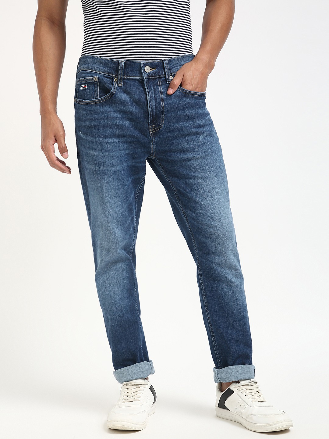 

Tommy Hilfiger Men Mid-Rise Low Distress Light Fade Jeans, Blue