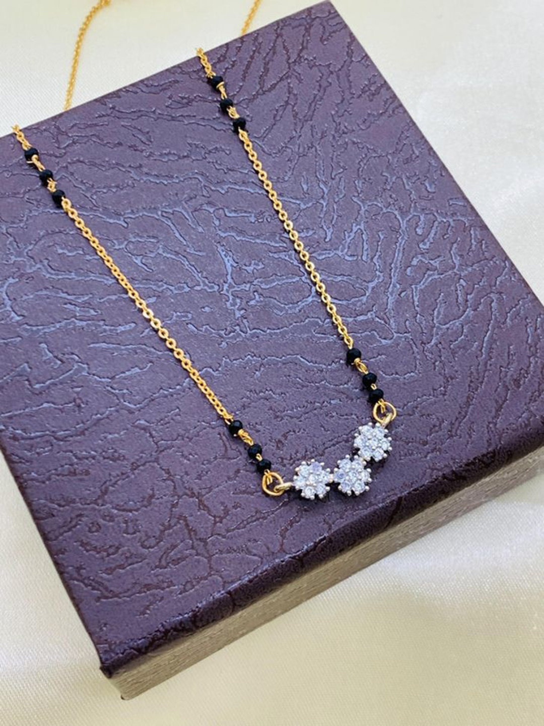 

Wynona Gold-Plated Studded & Beaded Tanmaniya Mangalsutra