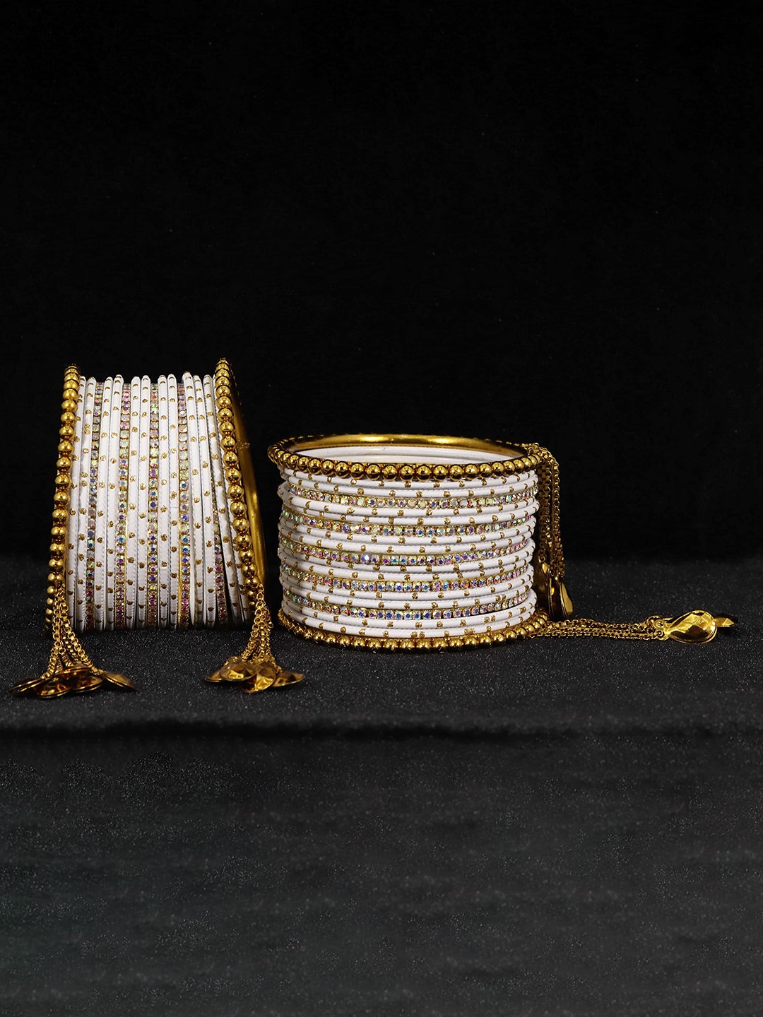 

Set of 42 Non-Precious Metal with Base Metal Zircon Gemstone Studded Velvet Bangles, White