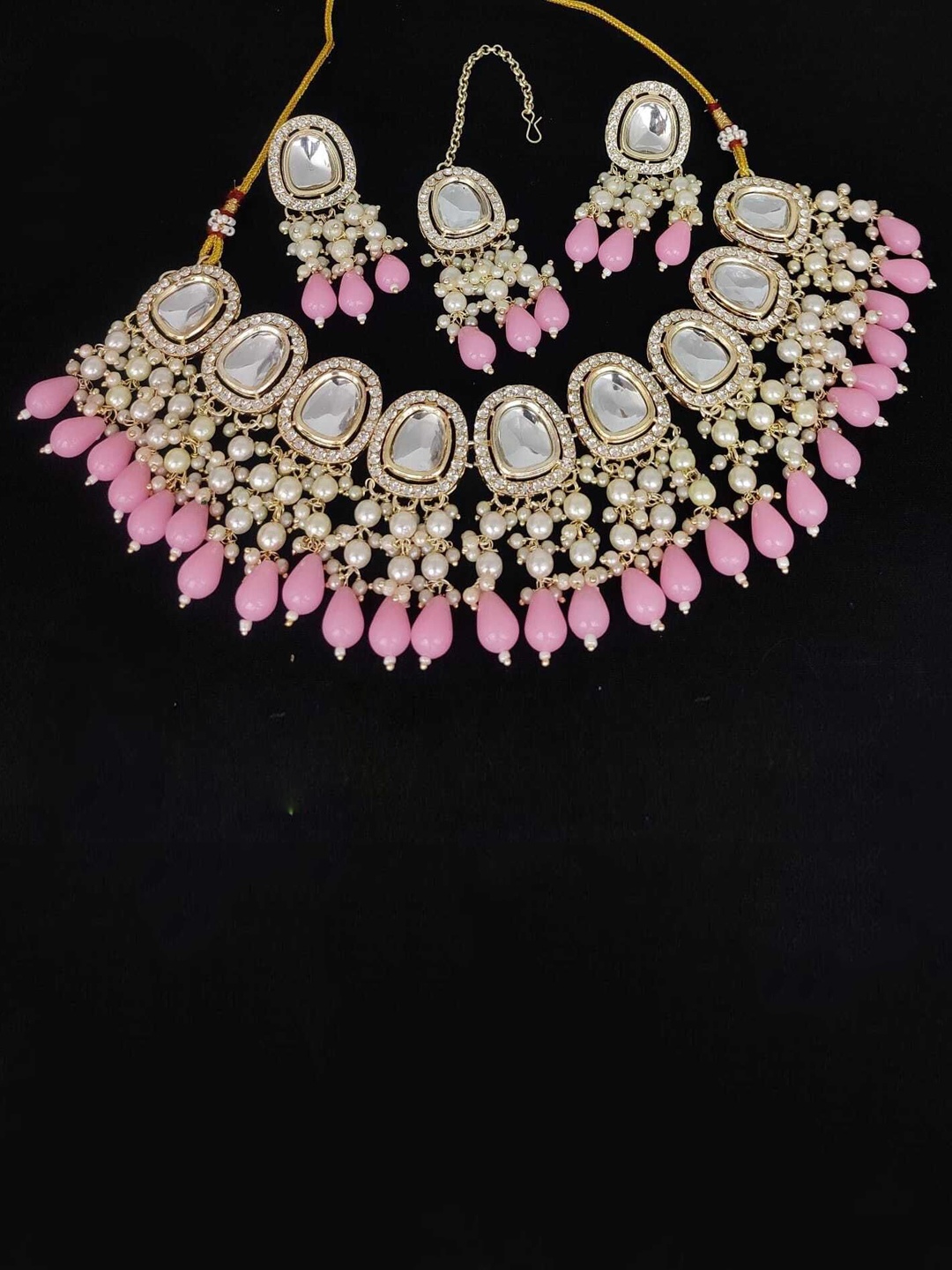 

Gyaan Jewels Gold Plated Stone Studded & Beaded Jewellery Set