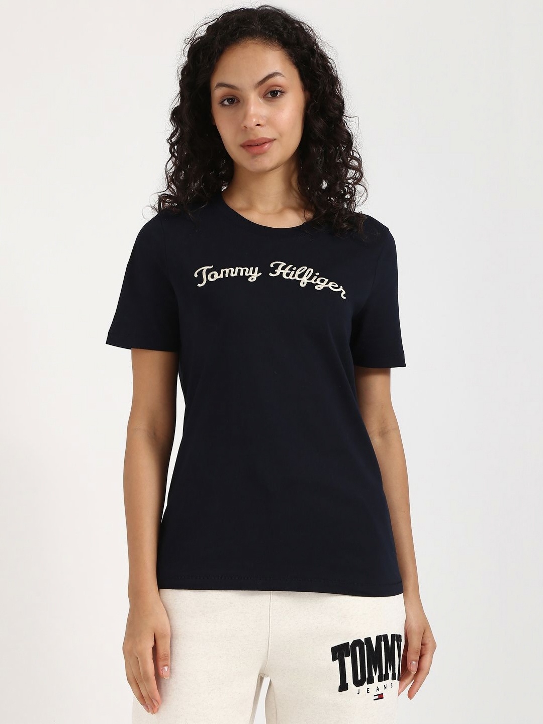 

Tommy Hilfiger Women Typography Printed Round Neck Cotton T-shirt, Black