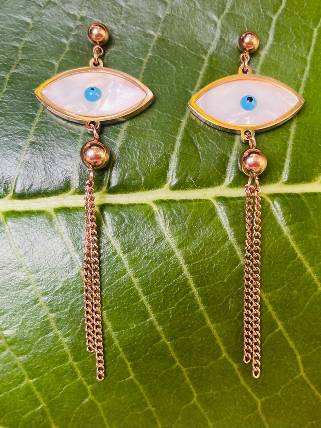 

MONI LIFESTYLE Gold Plated Artificial Stone Studded Contemporary Drop Earrings
