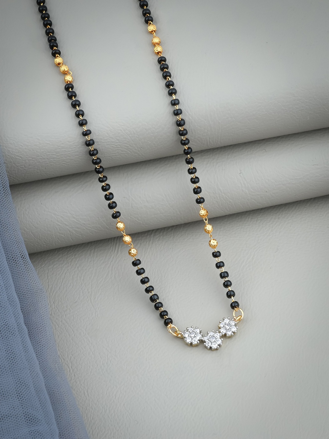 

Wynona Gold-Plated American Diamond Studded & Beaded Mangalsutra