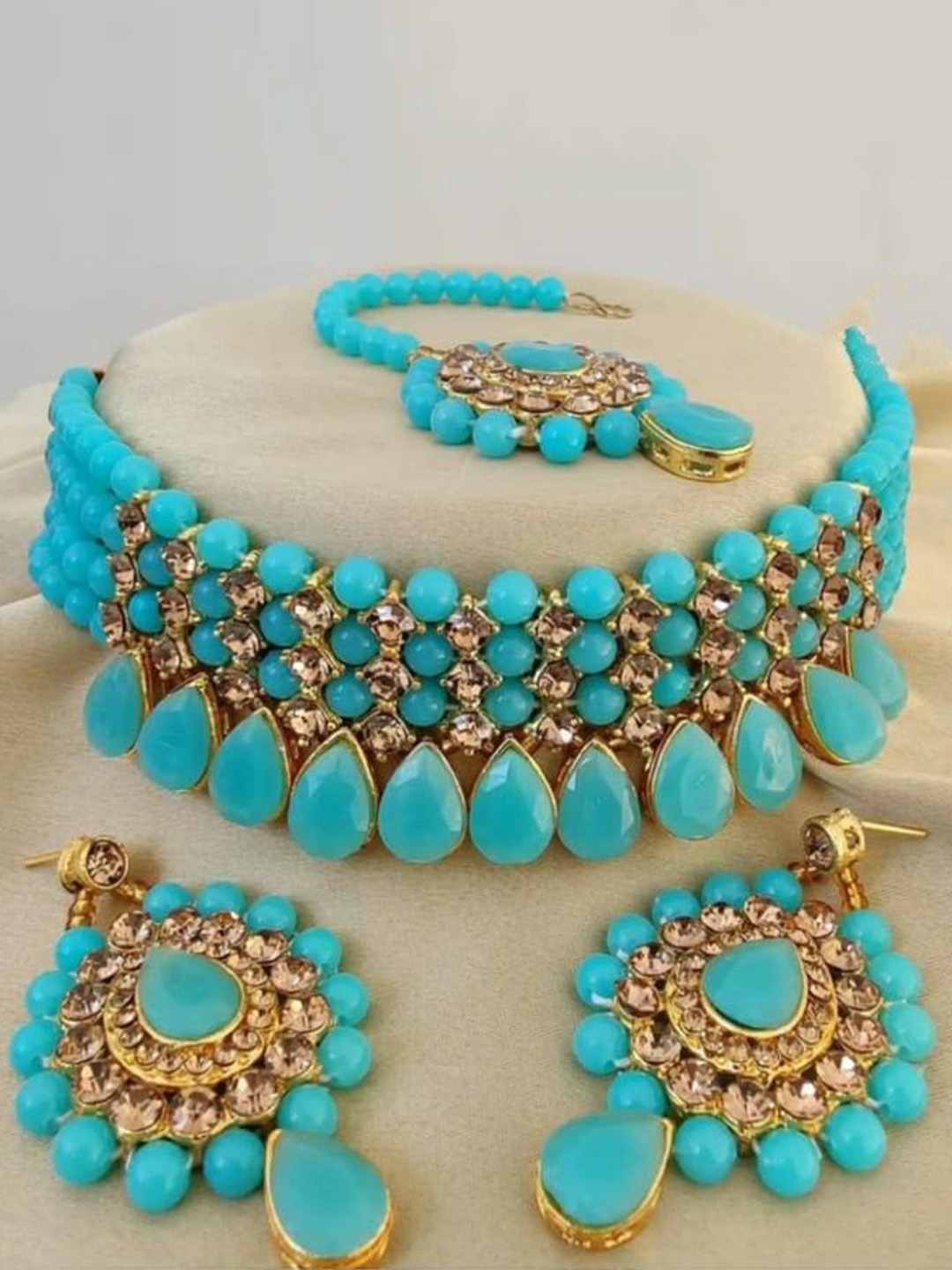 

Gyaan Jewels GoldPlated Artificial Stones and Beads Studded & Beaded Jewellery Set, Gold