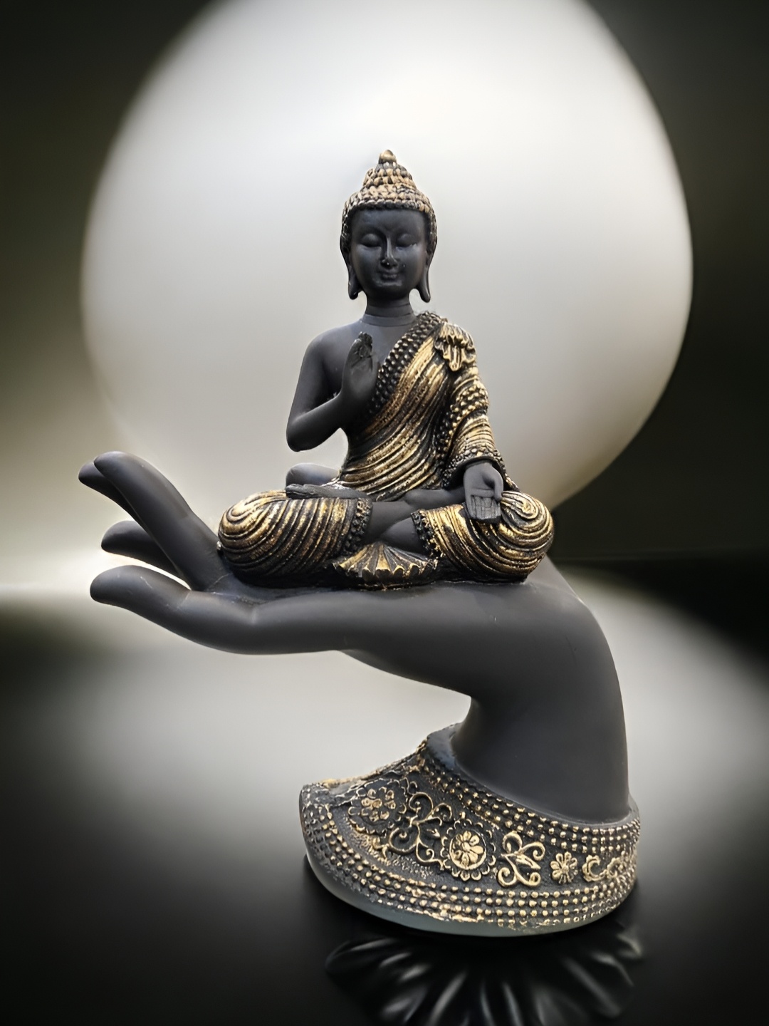 

SANKALAN CREATIONS Black Buddha Sitting On Palm With The Blessing Mudra Idol Showpiece