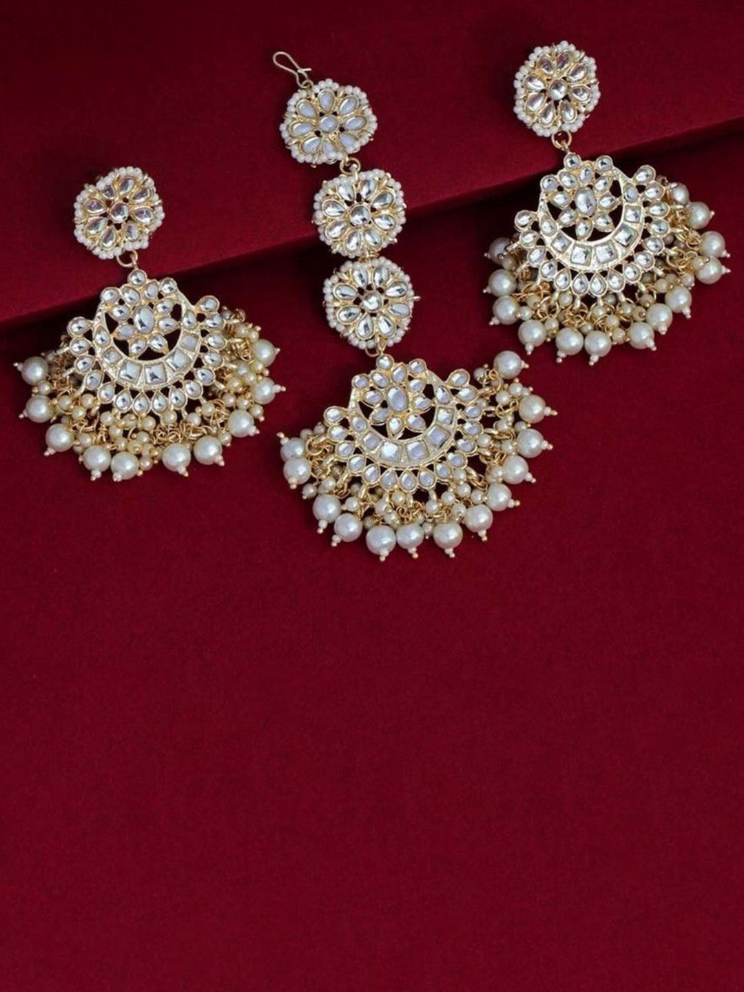 

Gyaan Jewels Gold-Plated Artificial Stones and Beads Studded & Beaded Jewellery Set