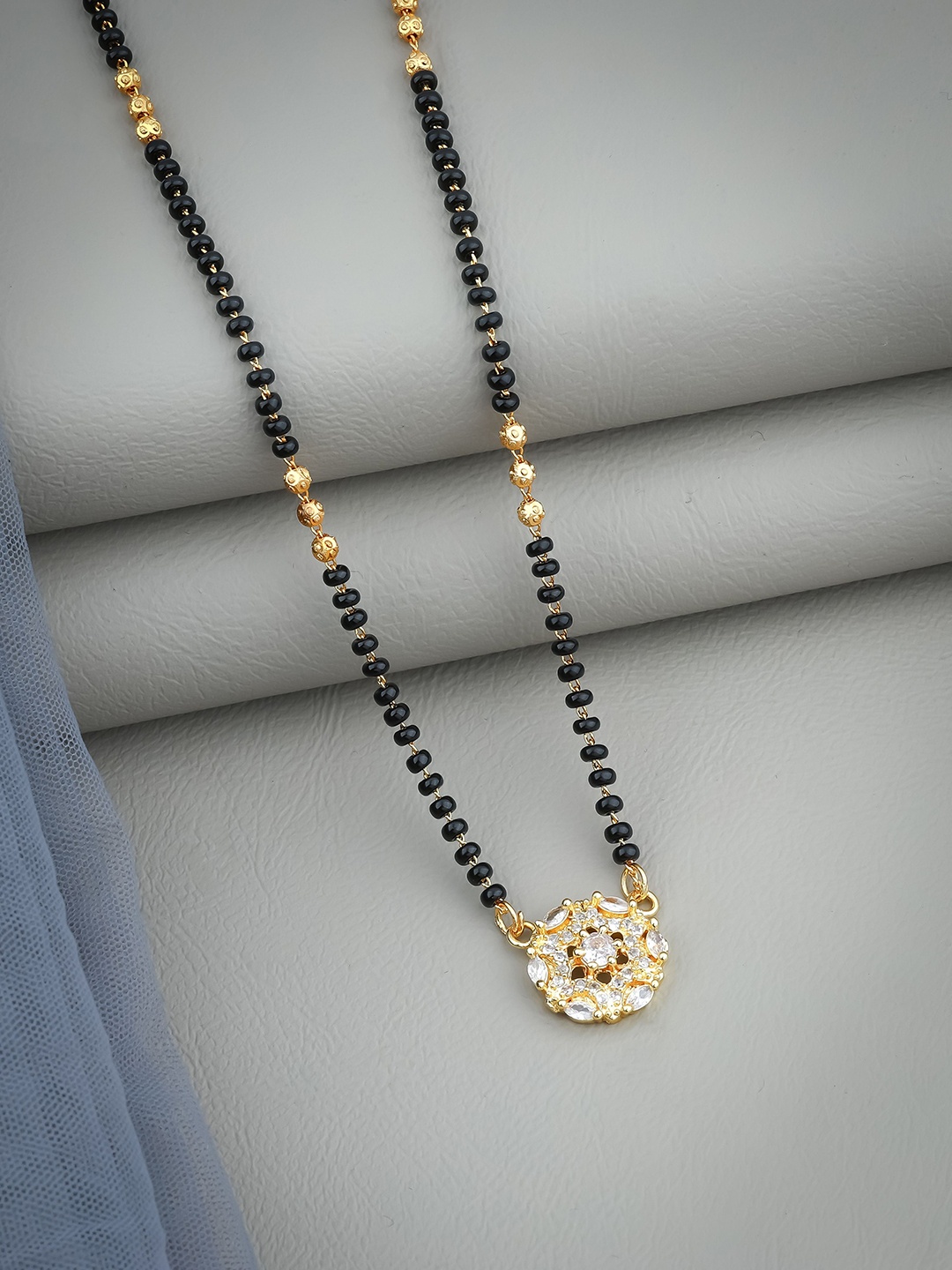 

Wynona Gold Plated American Diamond Stone Studded & Beaded Mangalsutra
