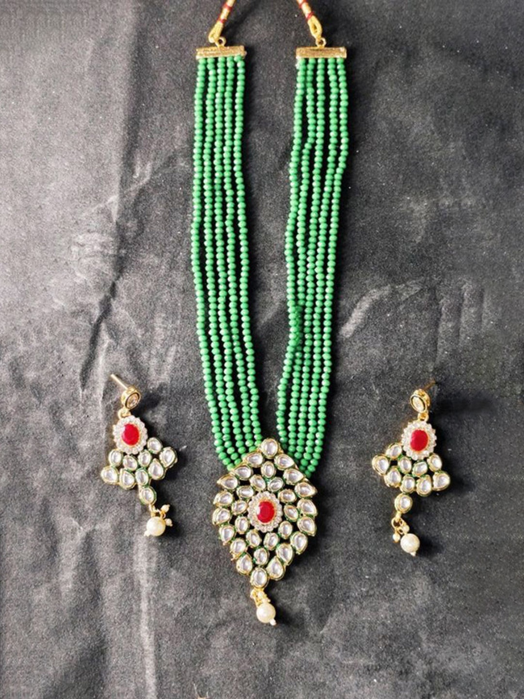 

Gyaan Jewels Gold-Plated Stone-Studded & Beaded Jewellery Set