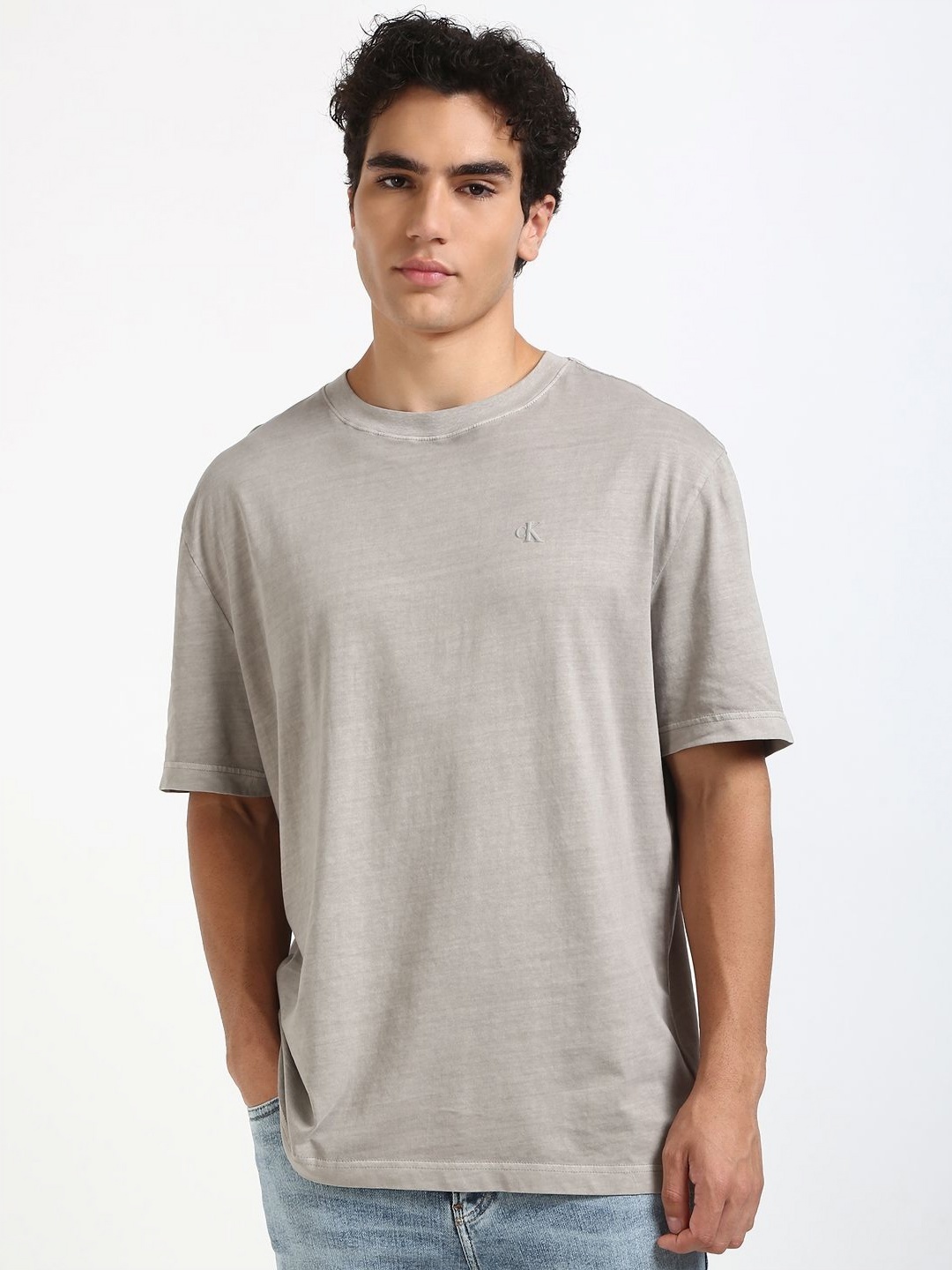 

Calvin Klein Jeans Men Self Design Round Neck Cotton Relaxed Fit T-shirt, Grey