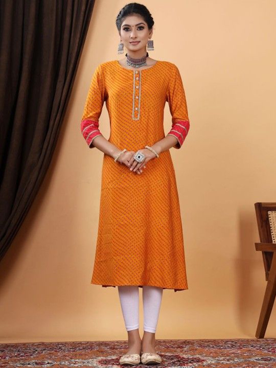 

Chandbaali Leheriya Printed Gotta Patti Panelled Cotton A-Line Kurta, Mustard