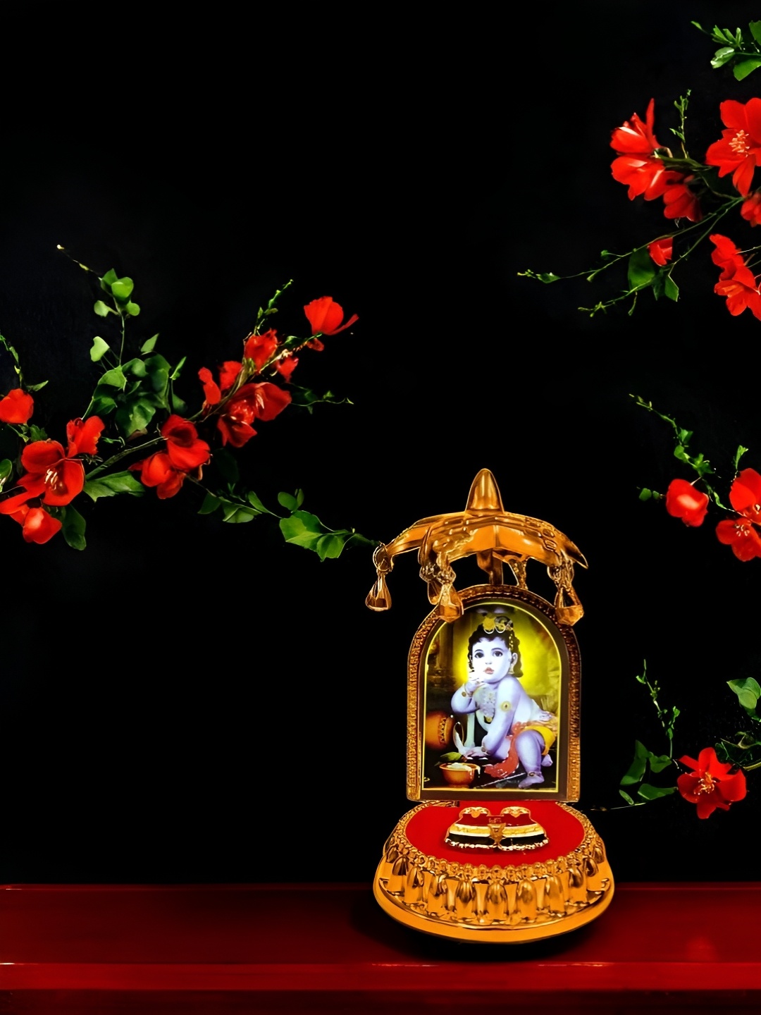 

Adhvik Gold Toned & Red Little Krishna Idol Showpiece