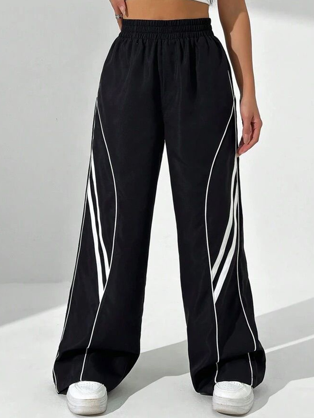 

SAAHASAM Women Striped Relaxed Loose Fit Trousers, Black