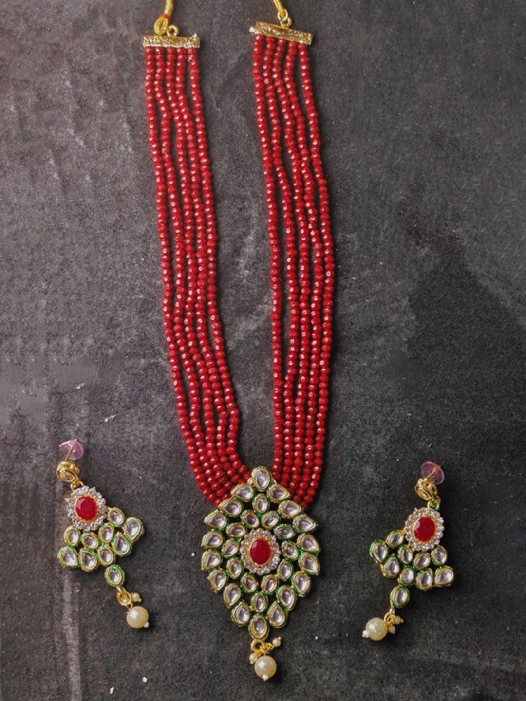 

Gyaan Jewels Gold-Plated Stone-Studded & Beaded Necklace and Earrings