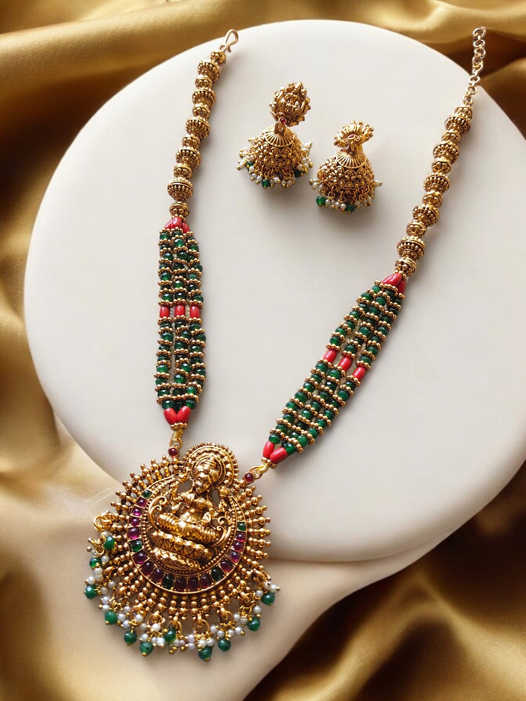 

Pihtara Jewels Gold-Plated Stone Studded & Beaded Temple Jewellery Set