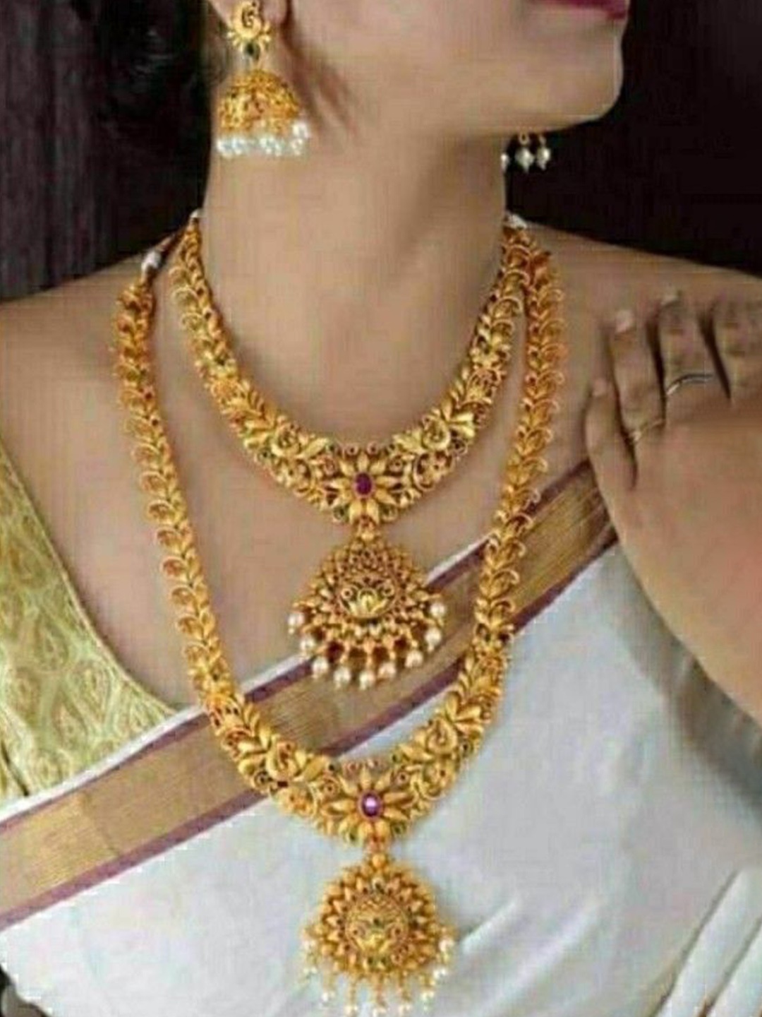 

Gyaan Jewels Gold-Plated Artificial Stones and Beads Studded & Beaded Jewellery Set