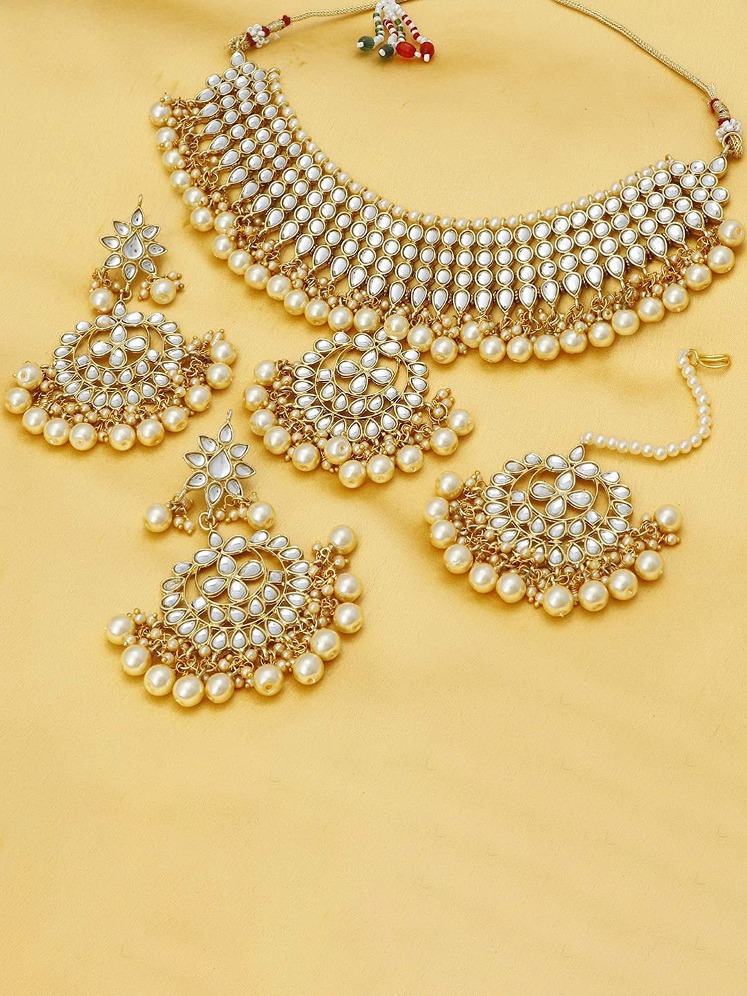 

Stefan Gold Plated Kundan Studded & Beaded Jewellery Set