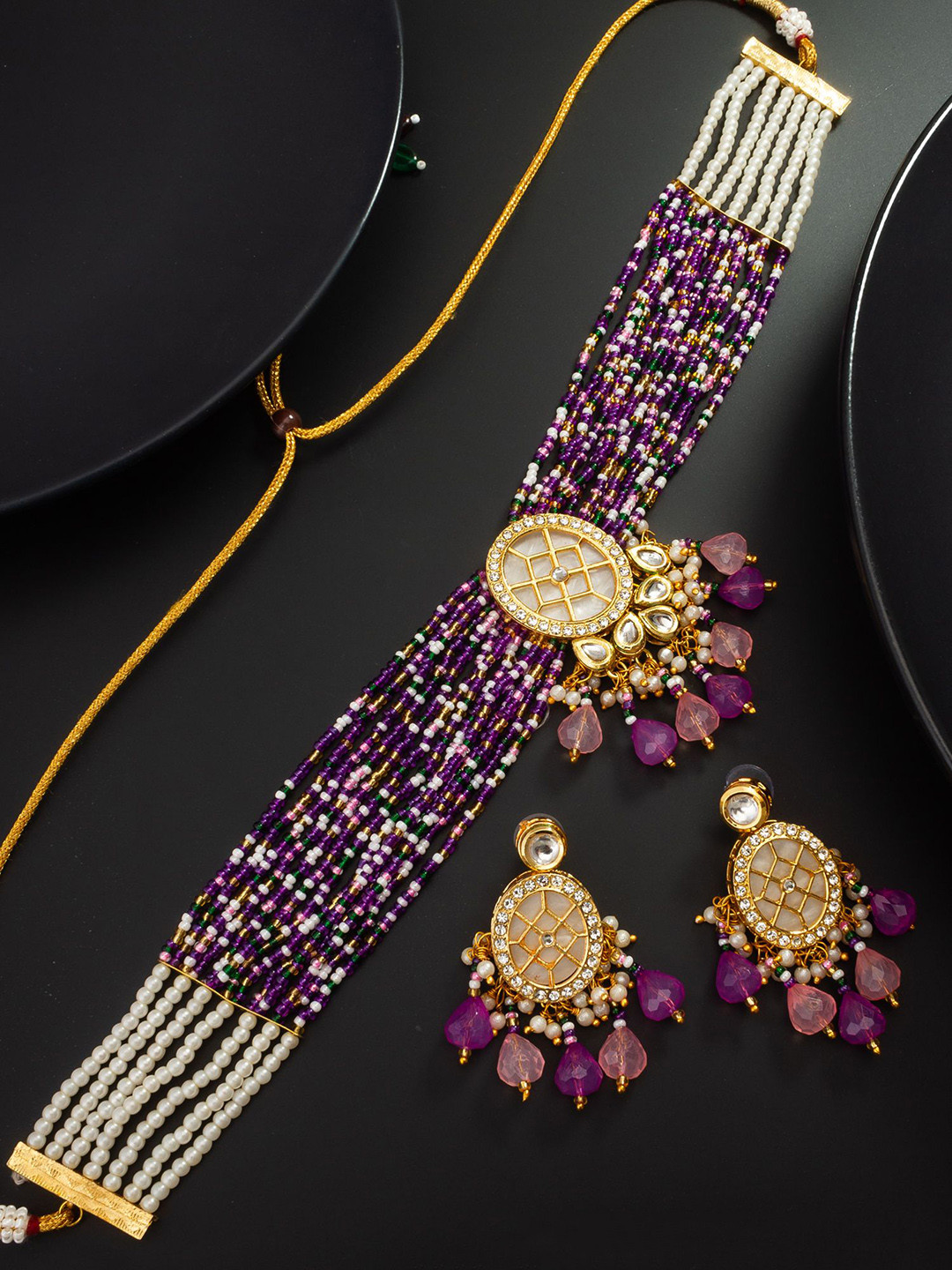 

aadita Gold-Plated Artificial Stones Studded & Beaded Jewellery Set