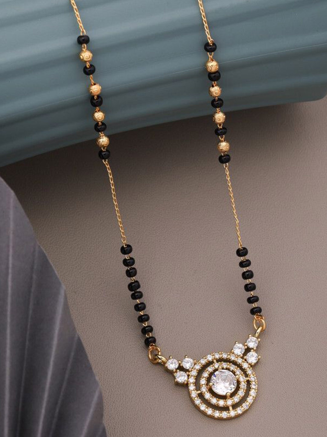 

Wynona Gold Plated American Diamond Studded & Beaded Mangalsutra