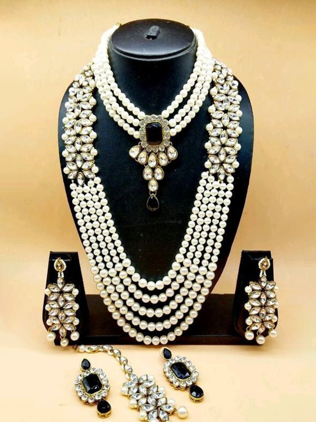 

Gyaan Jewels Gold-Plated Kundan Studded & Beaded Jewellery Set