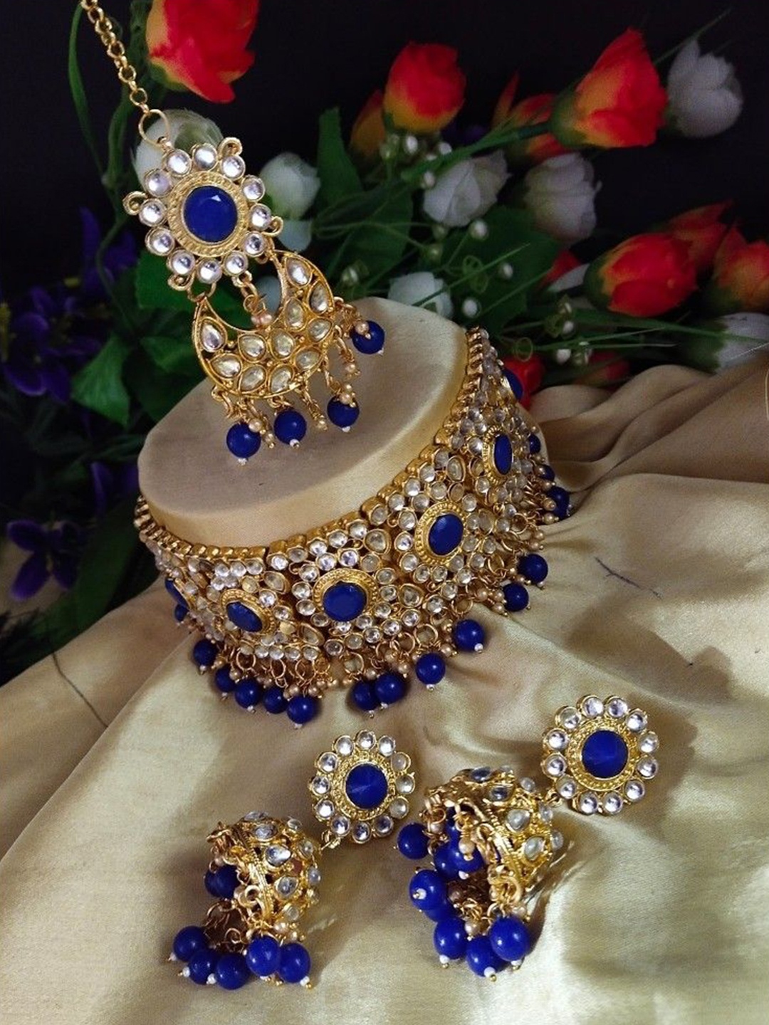 

Gyaan Jewels Gold-Plated Stone-Studded & Beaded Jewellery Set