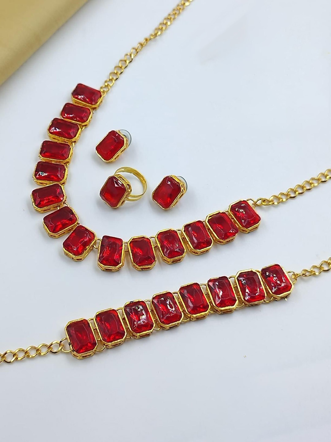 

Gyaan Jewels Stones Studded Jewellery Set, Red