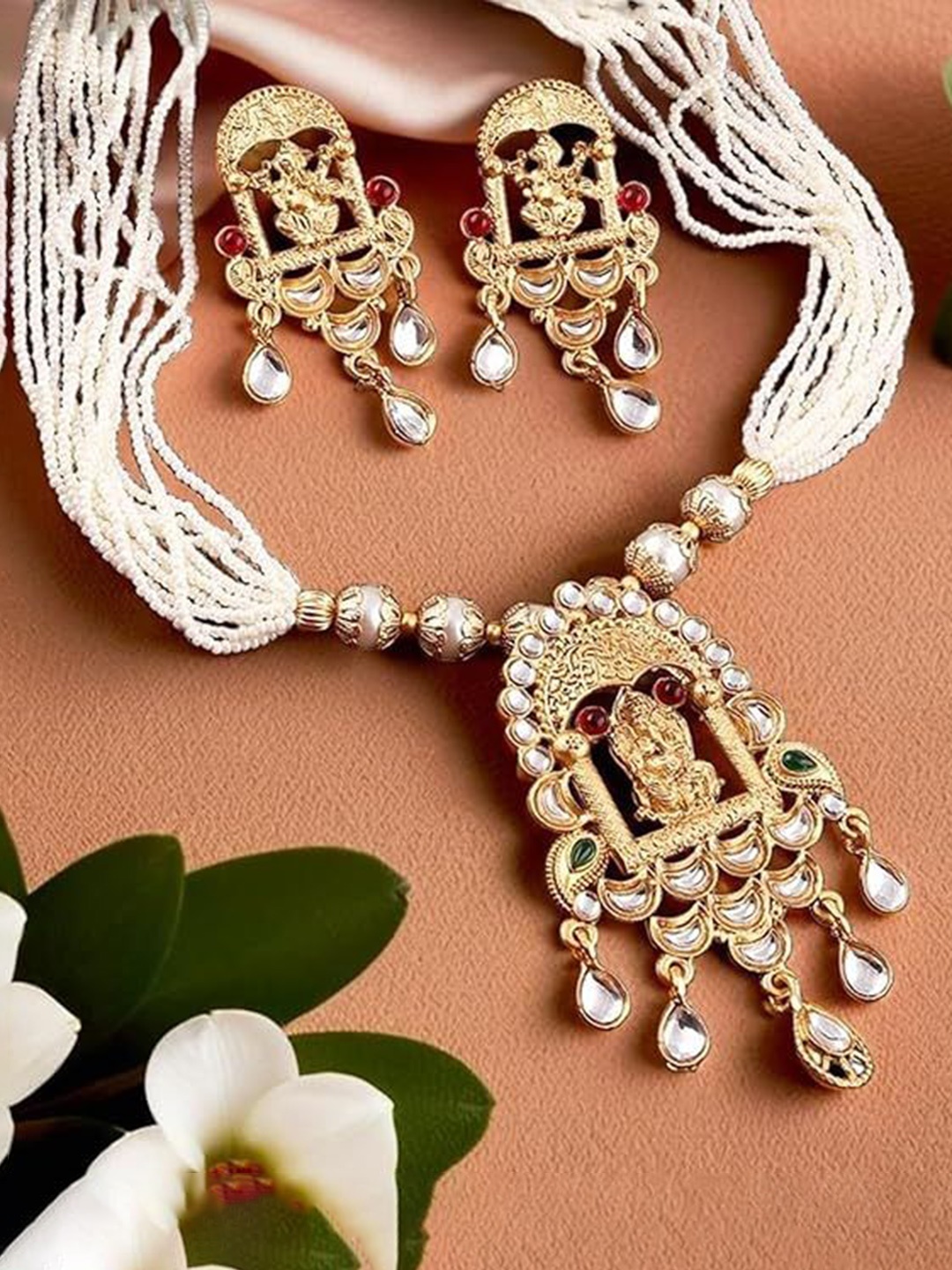 

ORANGENYSHA Gold Plated Pearls & Stone Studded Lord Ganesha Temple Jewellery Set