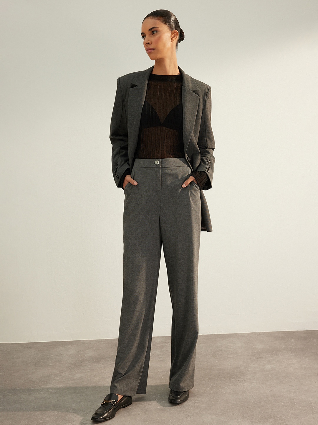 

Trendyol Women Solid Parallel Regular Fit Trousers, Grey