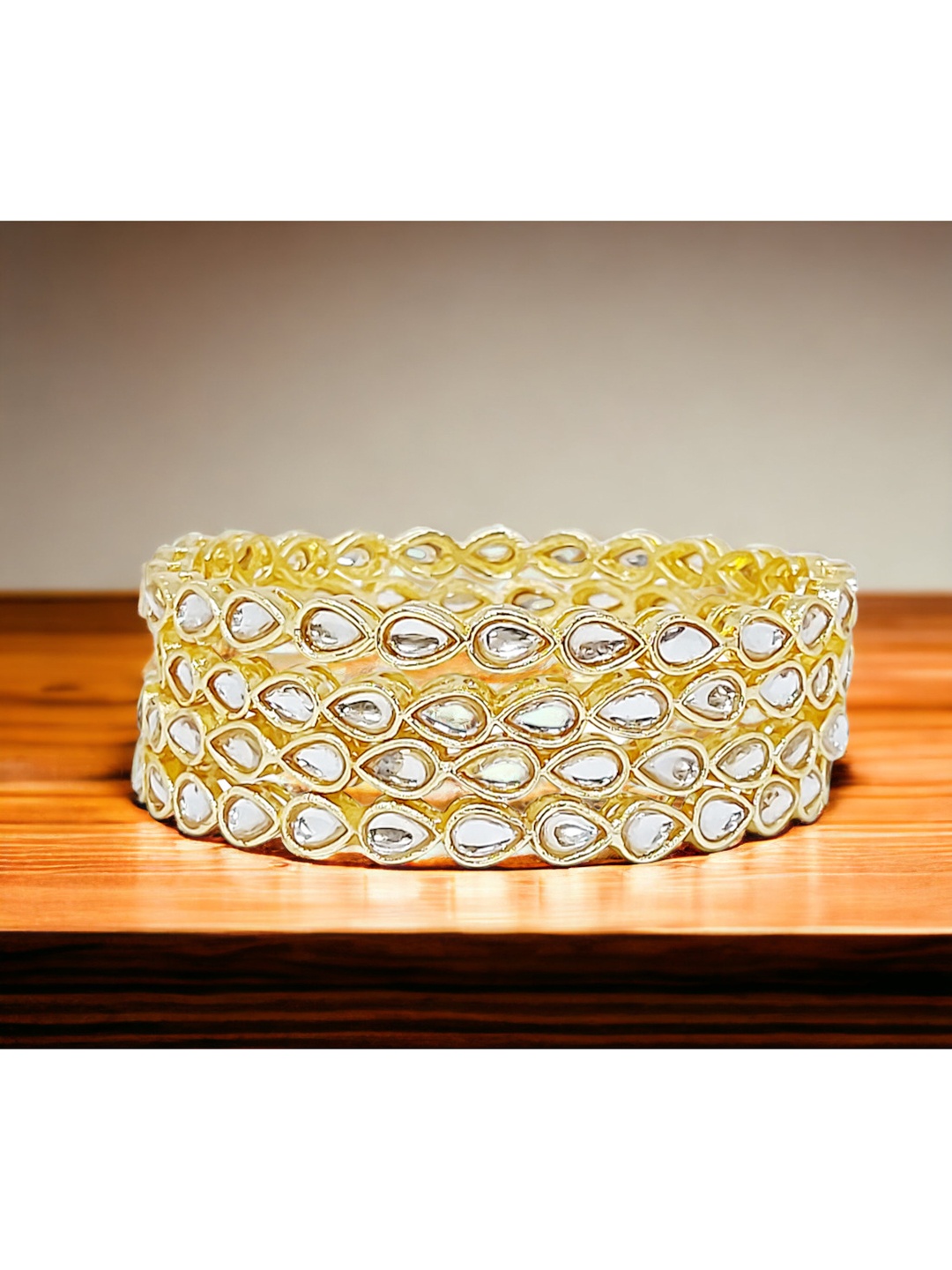 

CHRISHAN Set Of 4 Gold-Plated Stone Studded Bangles