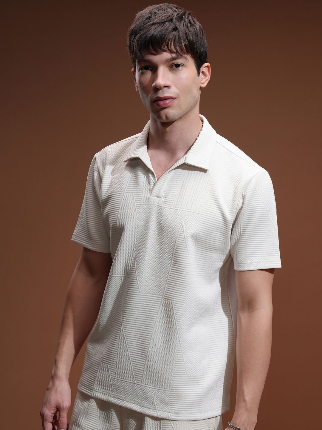 

HIGHLANDER Men Self Design Polo Collar Relaxed Fit T-shirt, Off white