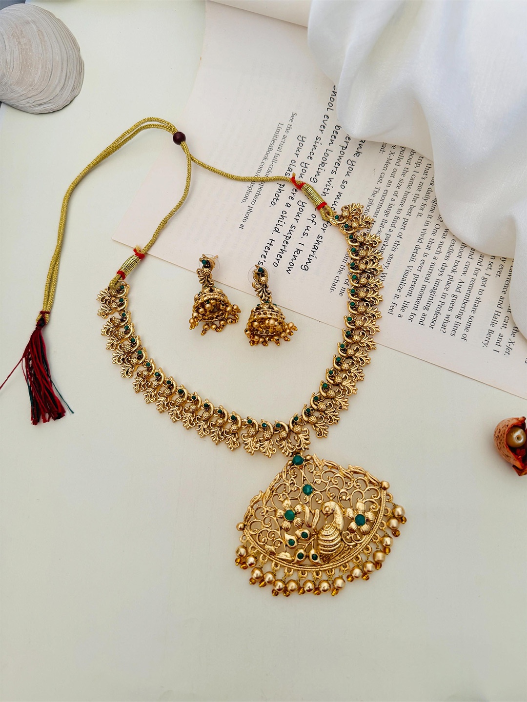 

ABDESIGNS Enchanting Gold-Plated Stone Studded Temple Jewellery Set