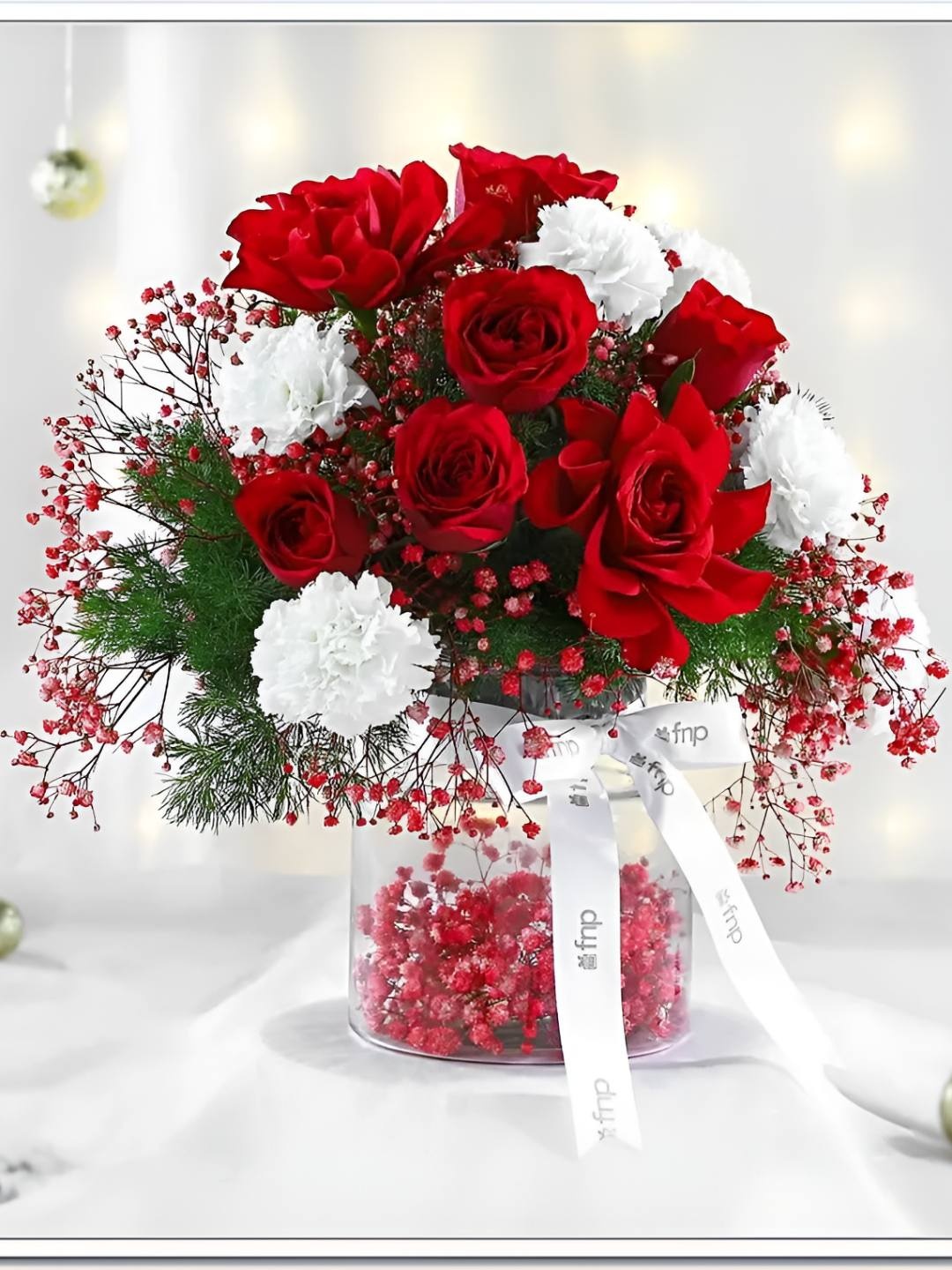 

fnp Red Roses & White 13 Pieces Carnation Winter Wonderland Fresh Flower Vase
