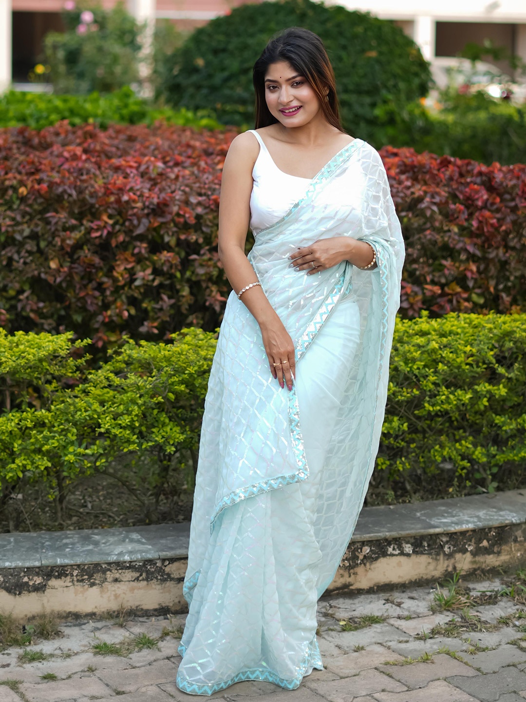 

KSM PRINTS Sequinned Embellished Pure Georgette Saree, Blue