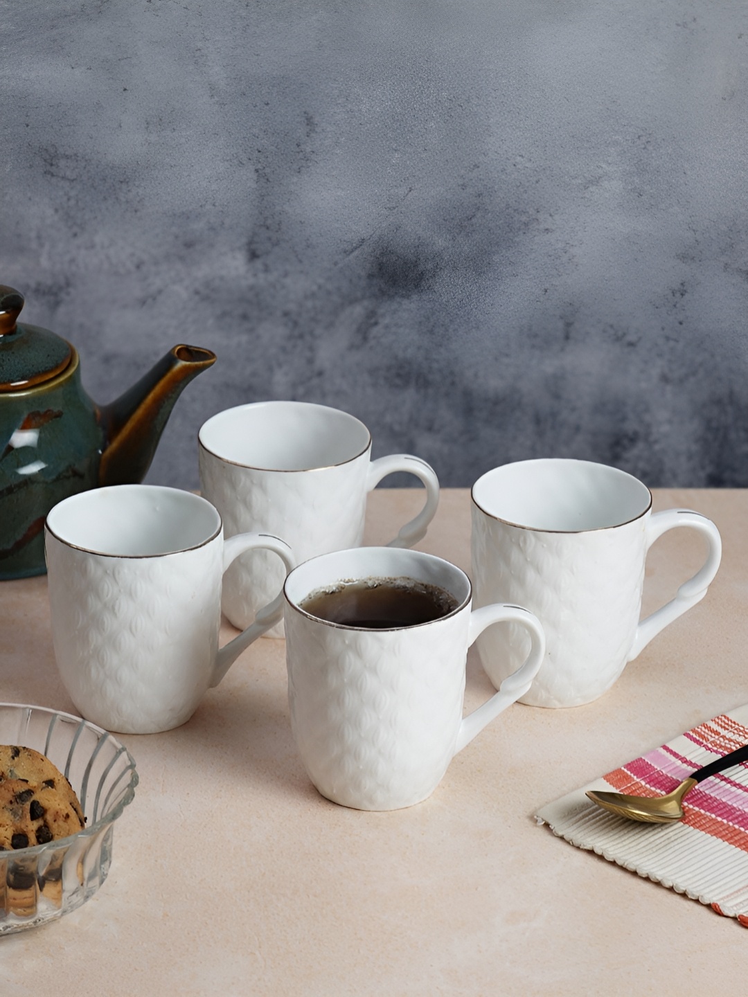 

CDI White 4 Pieces Geometric Textured Ceramic Glossy Mugs