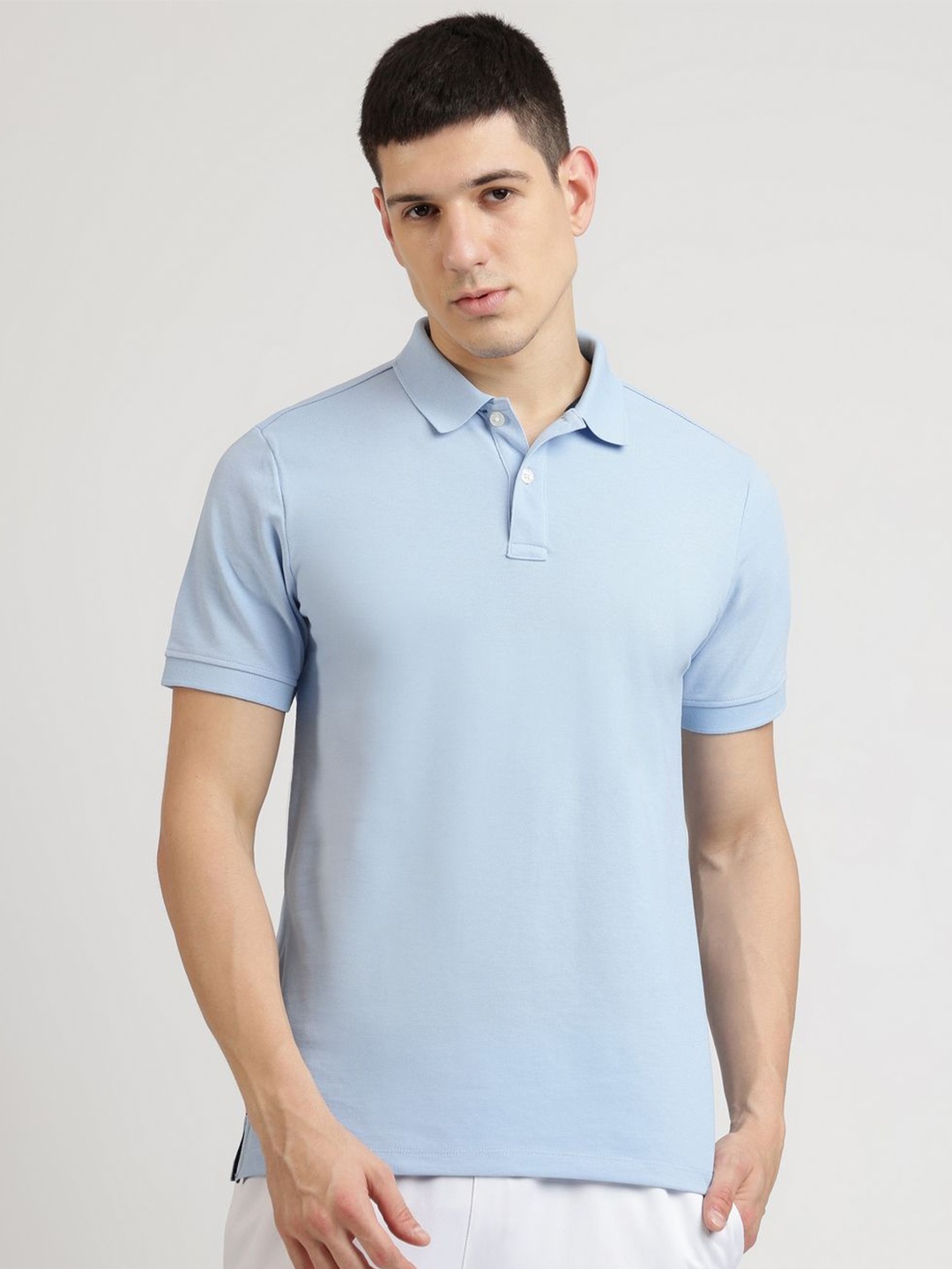 

Reebok Men Solid Polo Collar Cotton T-shirt, Blue