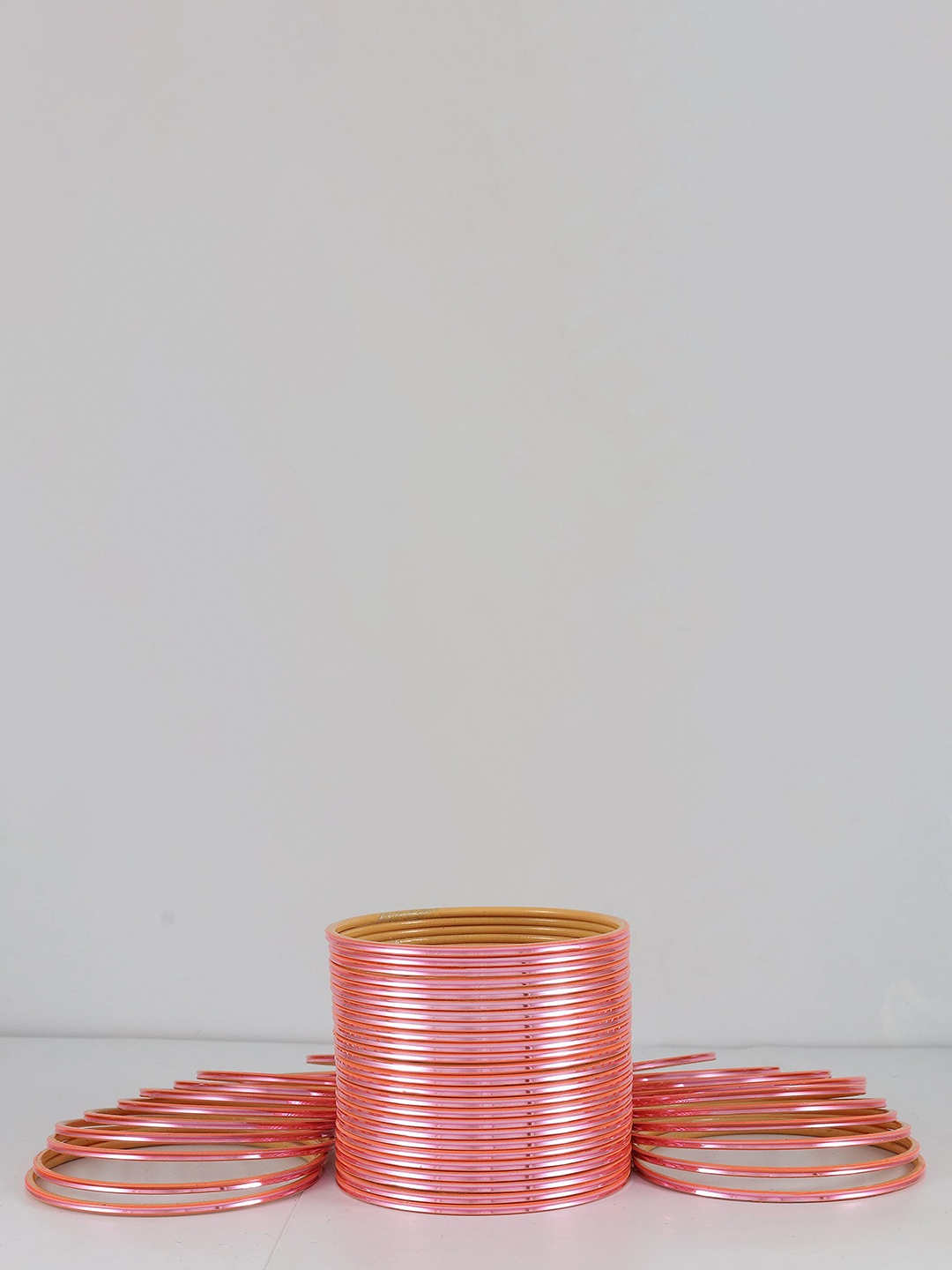 

Zulka Set of 48 Solid Glossy Finished Metal Bangles, Peach