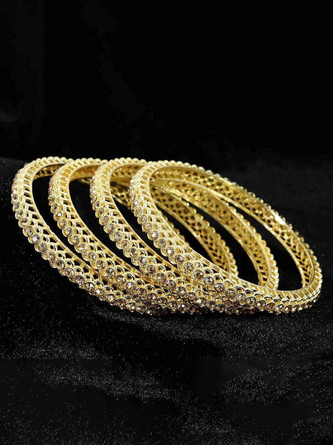 

Set of 4 Gold Plated Metal Bangles