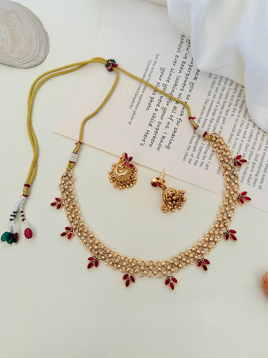 

ABDESIGNS Enchanting Gold-Plated Stone Studded Temple Jewellery Set