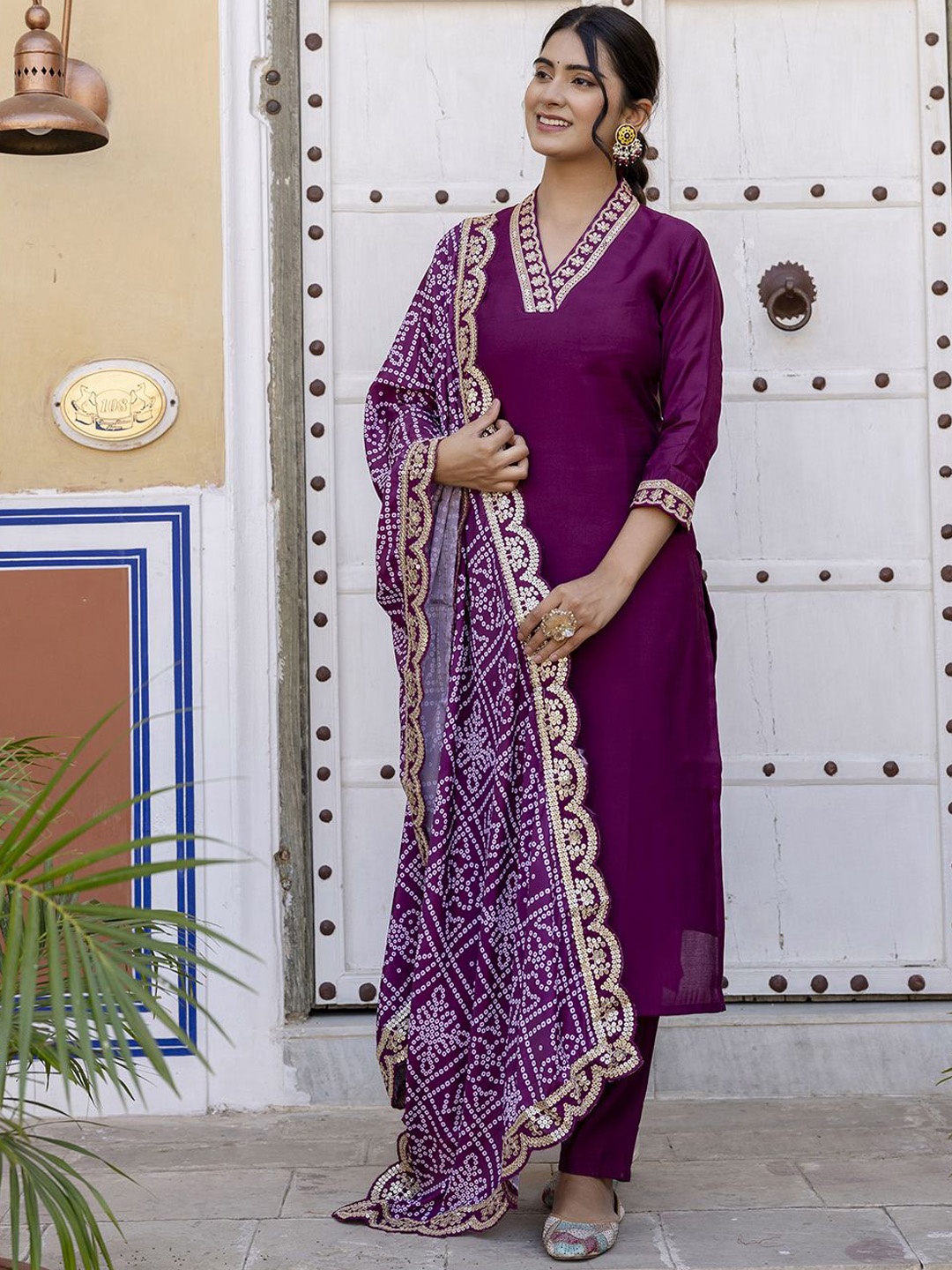 

Navlik V-Neck Yoke Design Sequinned Straight Kurta with Trousers & Dupatta, Purple