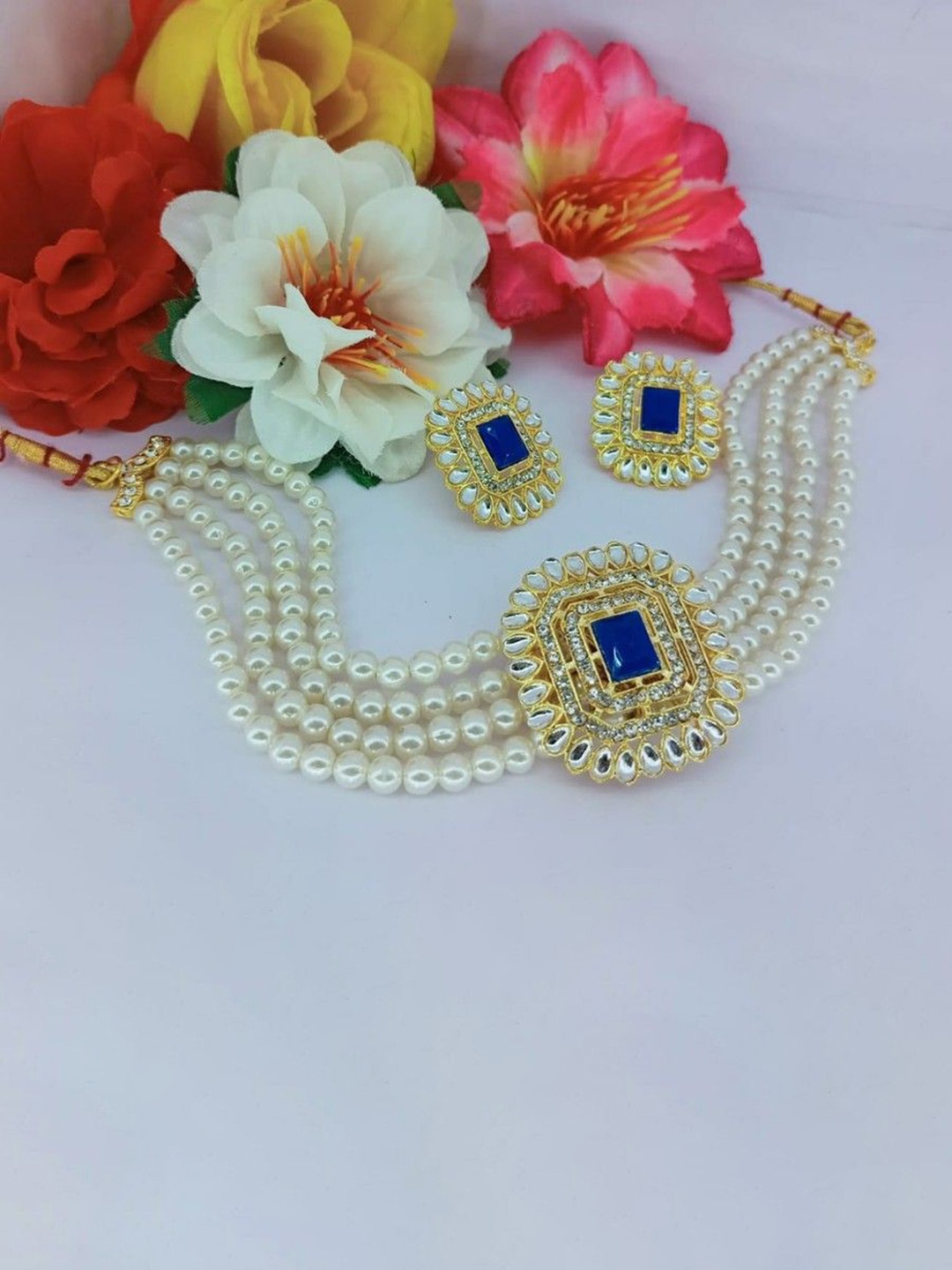 

Gyaan Jewels Gold-Plated Stone-Studded & Beaded Jewellery Set