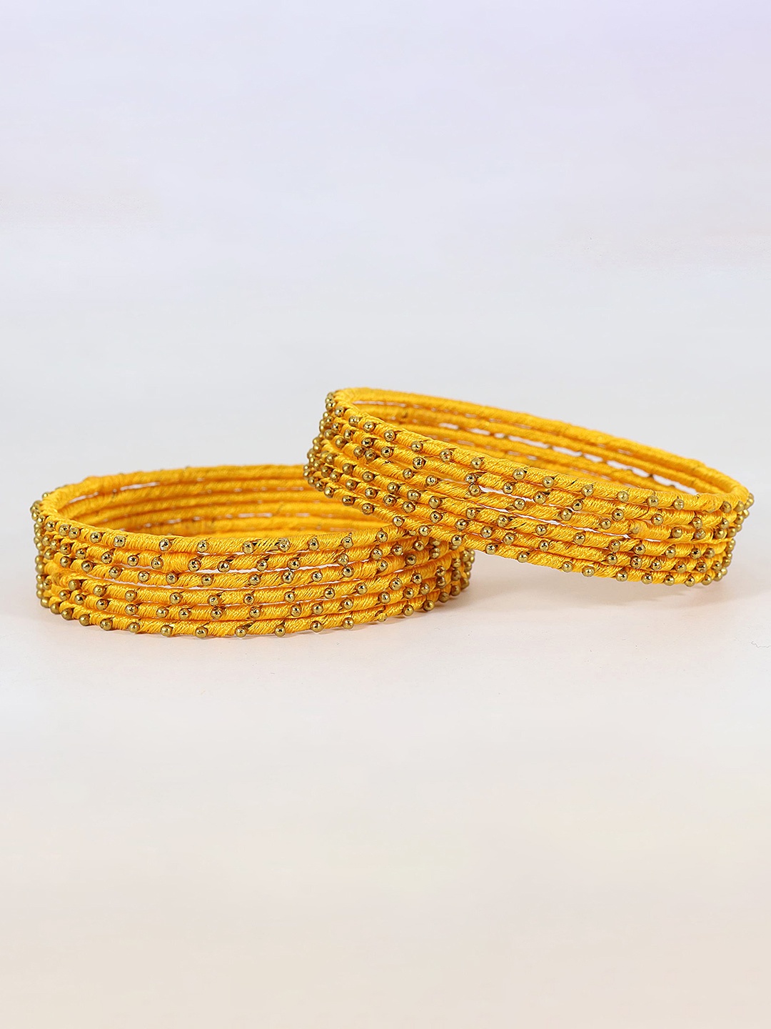 

ZULKA Set of 12 Metal with Silk Thread Ball Stone Bangle, Yellow
