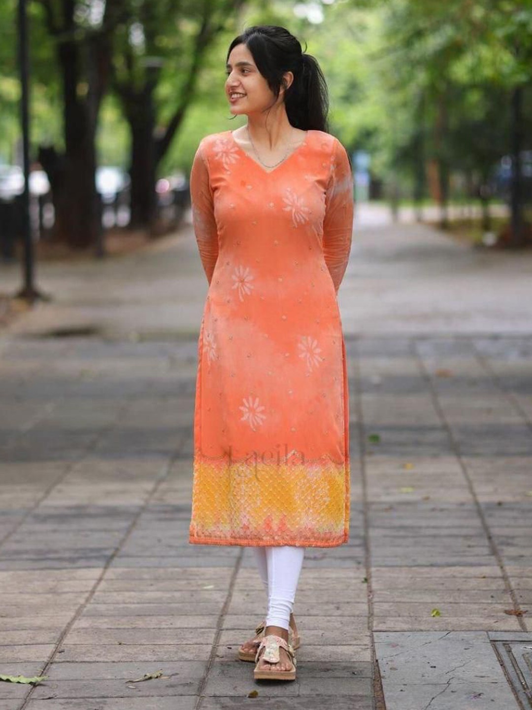 

Rujave Floral Printed Straight Kurta, Orange