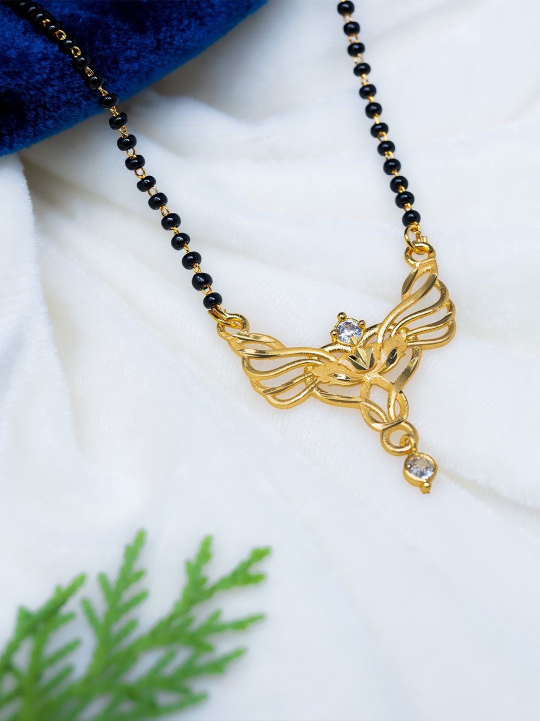 

GOLD CASH Gold-Plated Stone Studded and Beaded Floral Design Mangalsutra