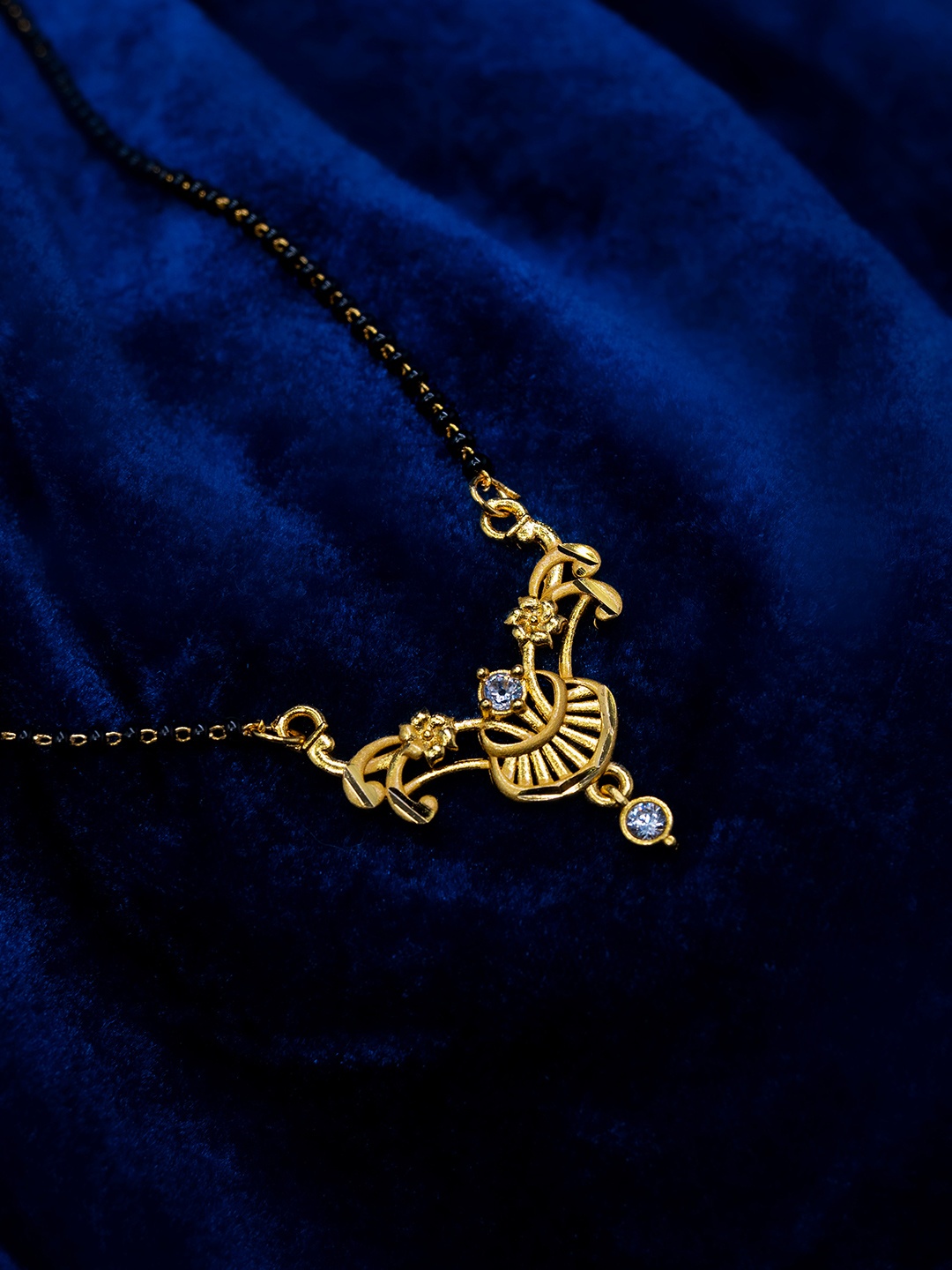 

GOLD CASH Gold-Plated Stone Studded and Beaded Mangalsutra