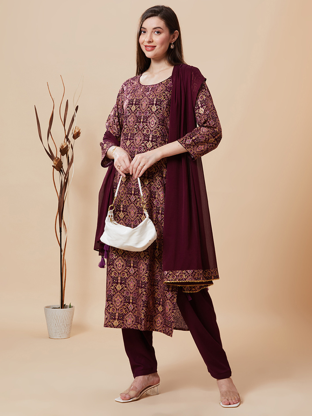 

Jeff co-op Bandhani Printed A-Line Kurta With Trouser & Dupatta, Purple