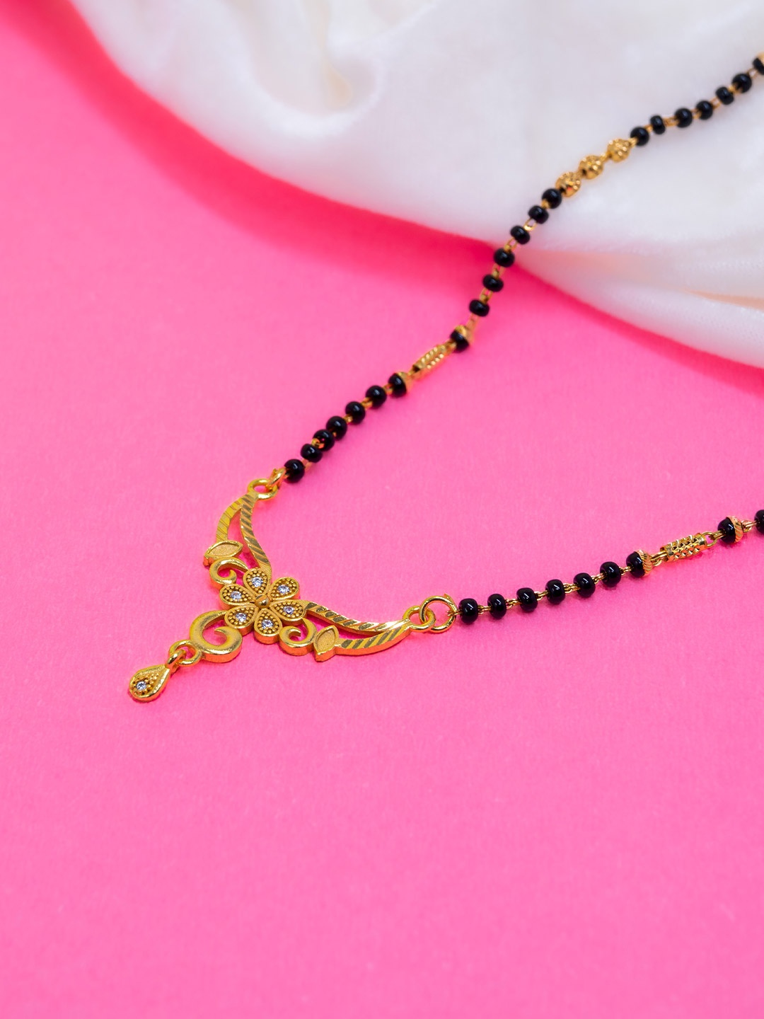 

GOLD CASH Gold-Plated Stone Studded and Beaded Mangalsutra