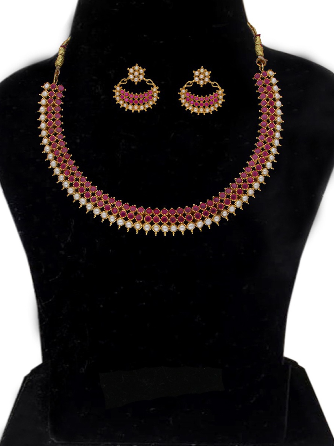 

Sri Jagdamba Pearls Dealer Gold-Plated Stone-Studded & Pearls Beaded Jewellery Set