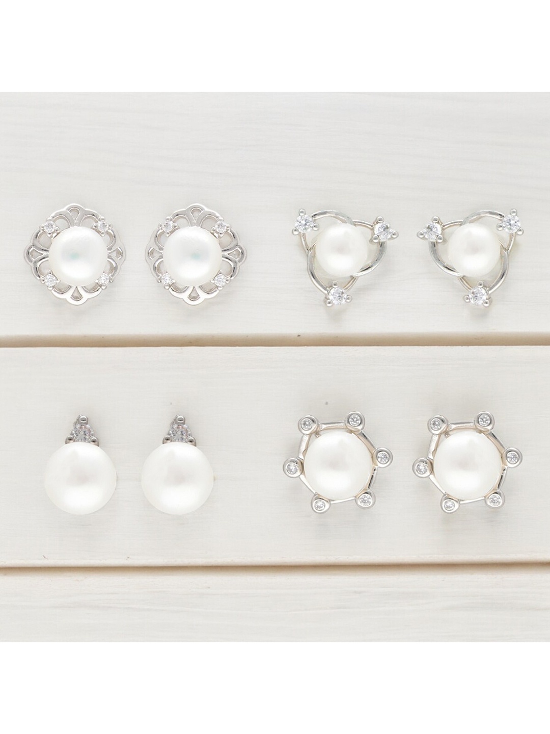 

Sri Jagdamba Pearls Dealer Silver-Plated Contemporary Studs, White